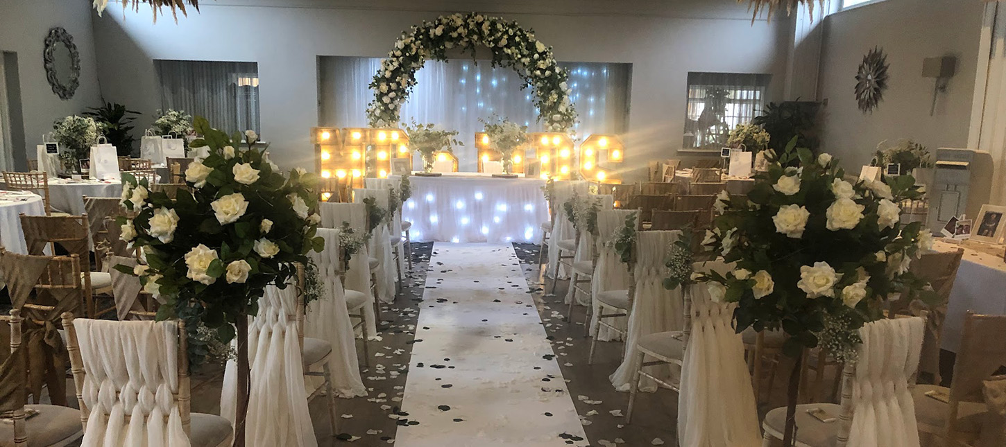 Weddings chairs and aisle